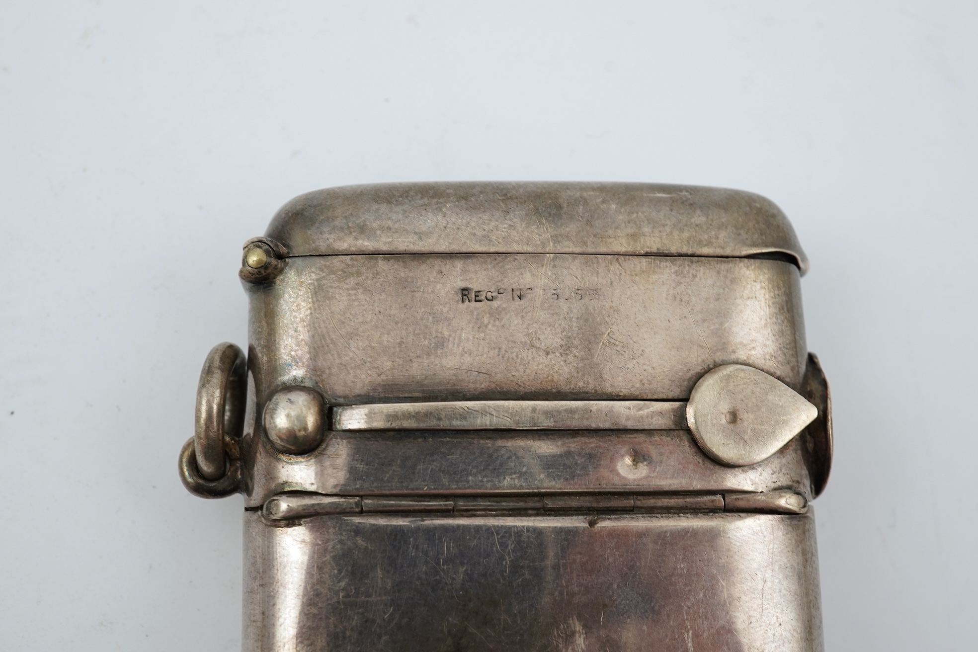 A late Victorian silver combination, cigar cutter, sovereign/half sovereign and vesta case by William Hair Haseler